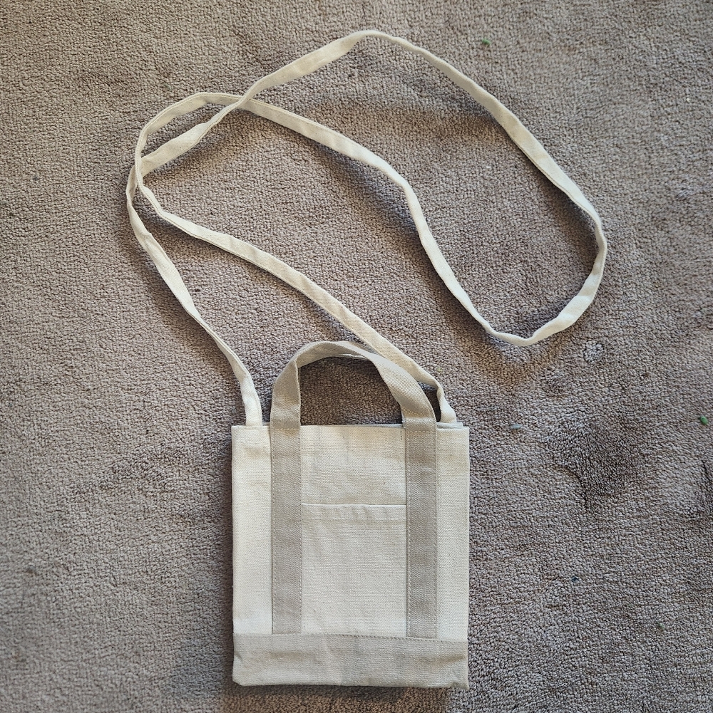Beige mini canvas tote bag with crossbody strap